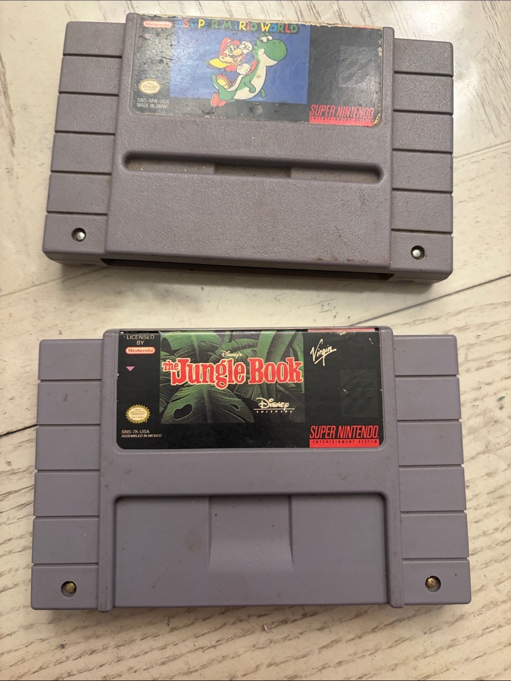 Disney Gray SNES Game Cartridges - The Jungle Book & Super Mario World